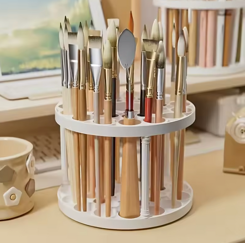 Circular 360° rotating brush holder with multiple compartments for organizing art brushes and makeup tools.