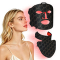 Woman wearing a red light therapy mask covering her face and neck, featuring multiple LED lights and adjustable straps.