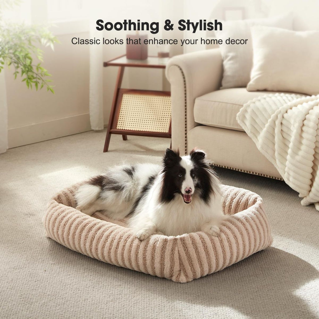 Soft striped dog bed in a cozy room setting with raised edges for added comfort.